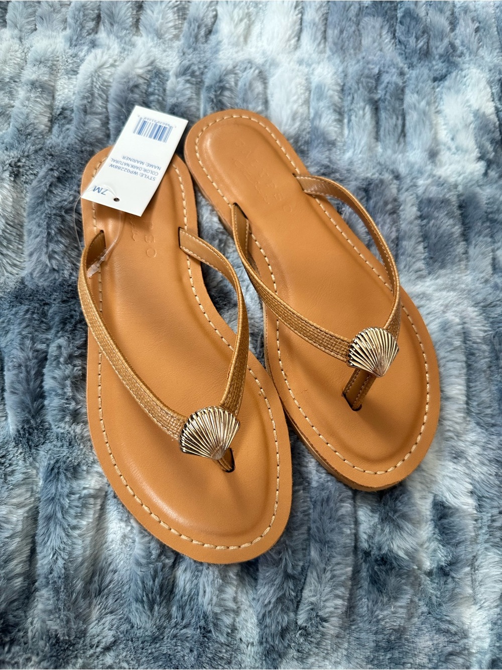 Calypso St. Barth Tan Flip Flop Sandals with Gold Shell Accent - Picture 2 of 3